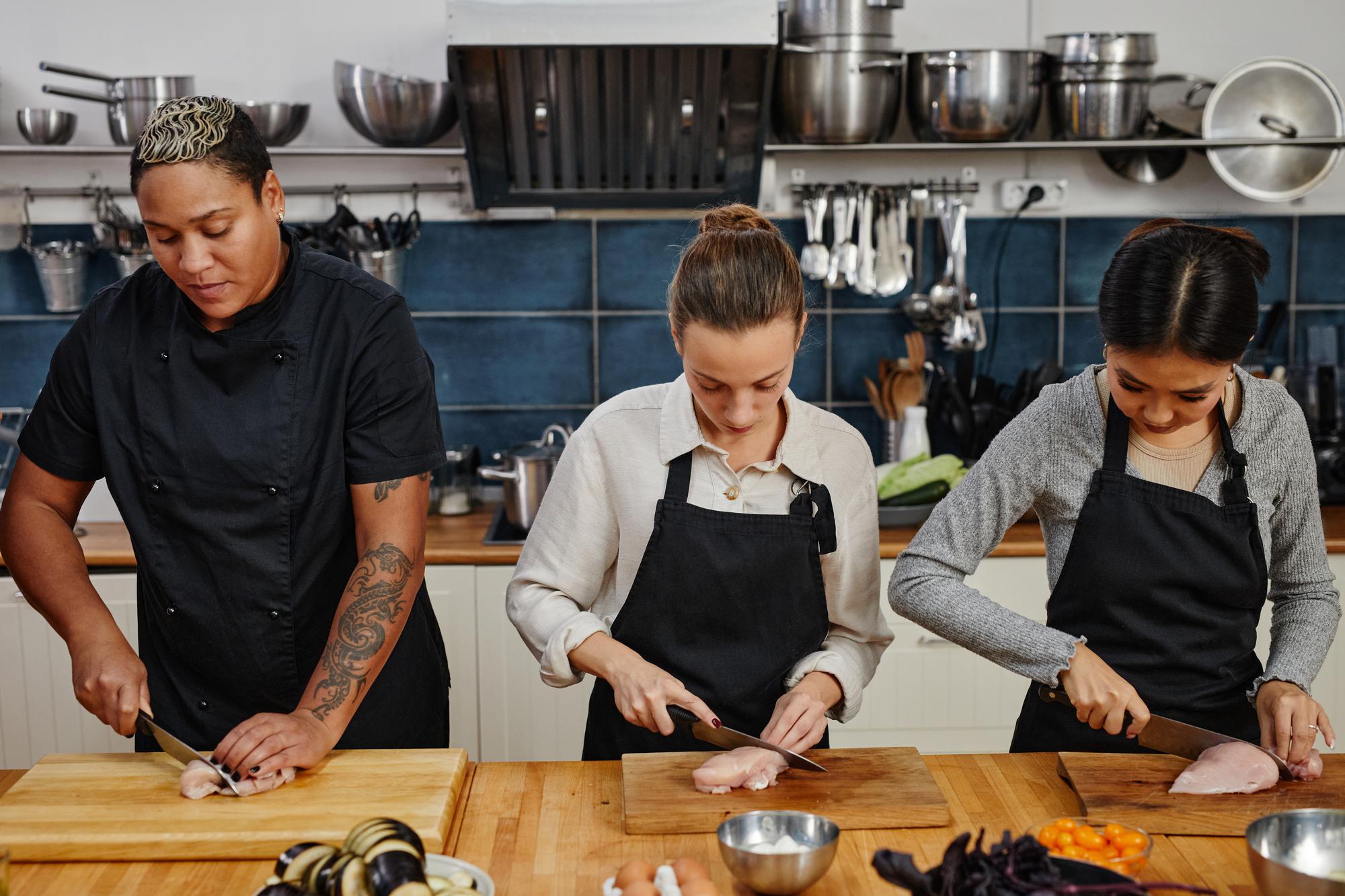 Chef instructing a small workshop